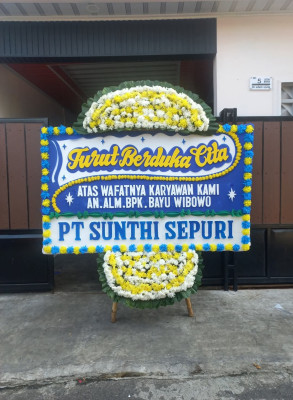 Papan Bunga Duka di Jair