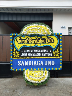 Papan Bunga Duka di Jair